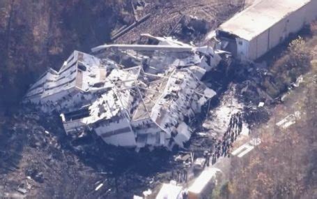 Crews work to rescue 2 trapped after collapse of Kentucky plant being demolished at abandoned mine